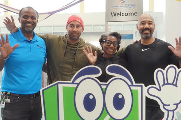 Director Stanton standing and waving next to FUN and M-NCPPC Employees