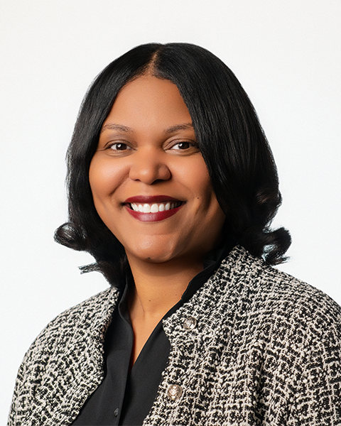 Black woman smiling at camera